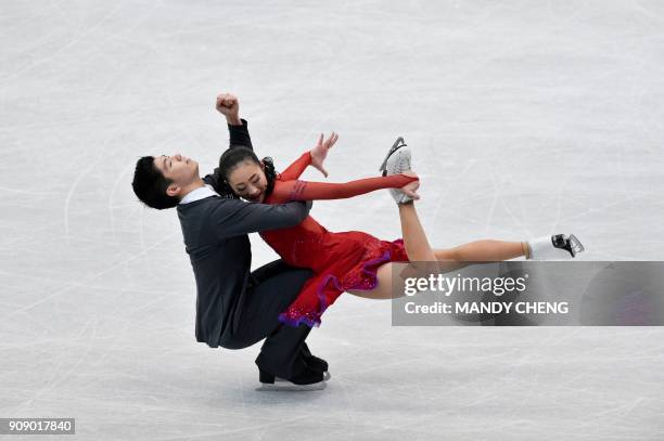 Rikako Fukase and Aru Tateno of Japan perform at a practice session during the ice dance - free dance at the ISU Four Continents Figure Skating...