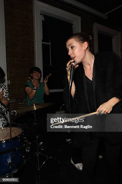 Recording artist Lykke Li and Bjorn Yttling performs at "Photopass: A Medium Format" exhibition by Aaron Stern at Studio 385 on September 17, 2009 in...