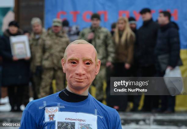 Mannequin depicting Russian President Vladimir Putin dressed in a football uniform, during the &quot;Stop Putin. Stop war&quot; rally and &quot;Kick...