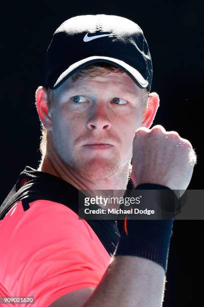 Kyle Edmund of Great Britain celebrates winning the third set in his quarter-final match against Grigor Dimitrov of Bulgaria on day nine of the 2018...