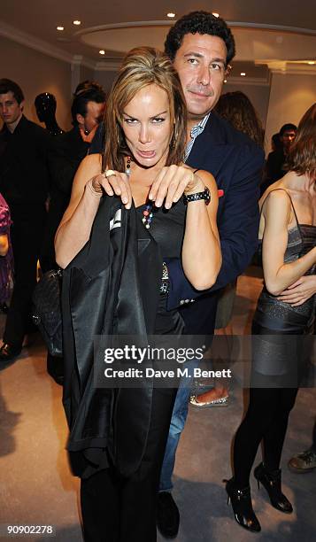 Tara Palmer-Tomkinson and boyfriend Eduardo Teodorani-Fabbri attend the Hervé Léger by Max Azria London Store Launch Party on September 17, 2009 in...
