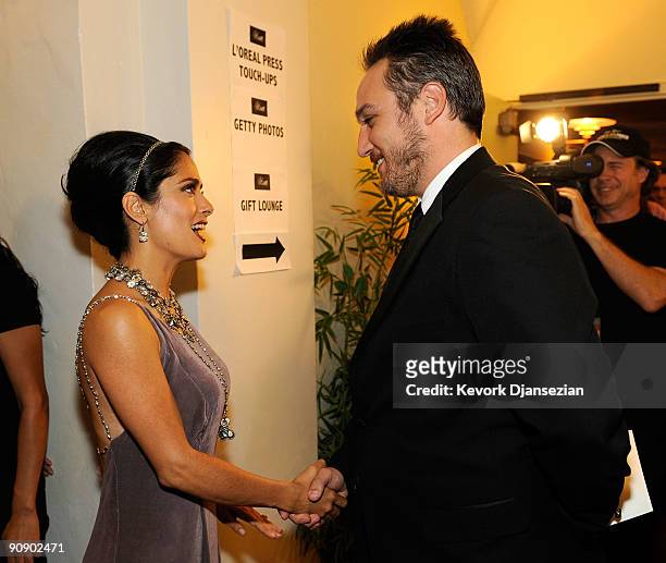 Actors Salma Hayek and Alex A. Quinn talk during the 2009 ALMA Awards held at Royce Hall on September 17, 2009 in Los Angeles, California.
