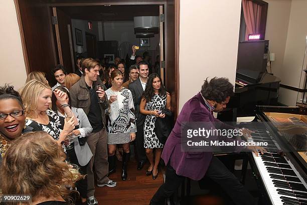 Pianist Eric Lewis performs during the exclusive opening of the Renaissance New York Hotel 57 on September 17, 2009 in New York City.