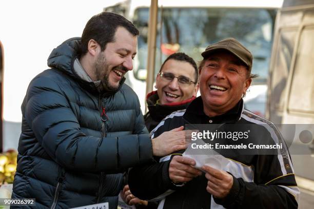 Matteo Salvini jokes with a street vendor as he visits an open-air market on January 22, 2018 in Milan, Italy. Salvini, leader of the right-wing...