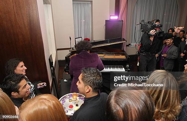 Pianist Eric Lewis performs during the exclusive opening of the Renaissance New York Hotel 57 on September 17, 2009 in New York City.