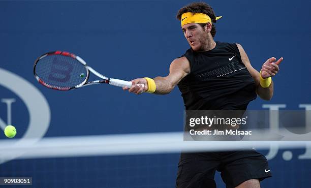 Juan Martin Del Potro of Argentina returns a shot against Roger Federer of Switzerland during the Men's Singles final on day fifteen of the 2009 U.S....