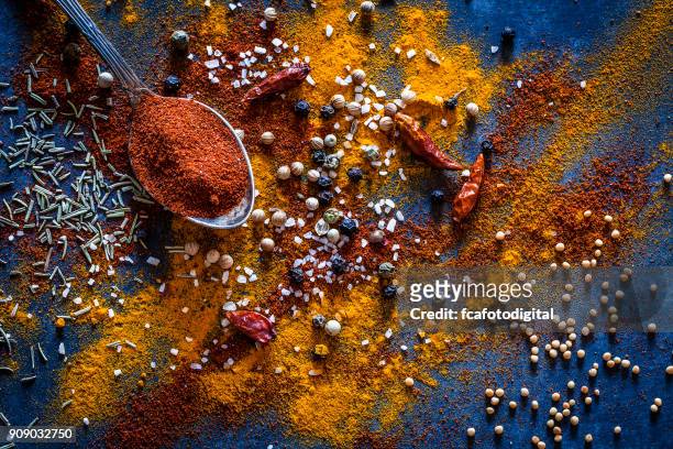 ground spices background - spice stock pictures, royalty-free photos & images