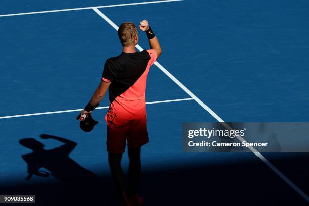 Kyle Edmund of Great Britain celebrates winning match point in his quarter-final match against Grigor Dimitrov of Bulgaria on day nine of the 2018...