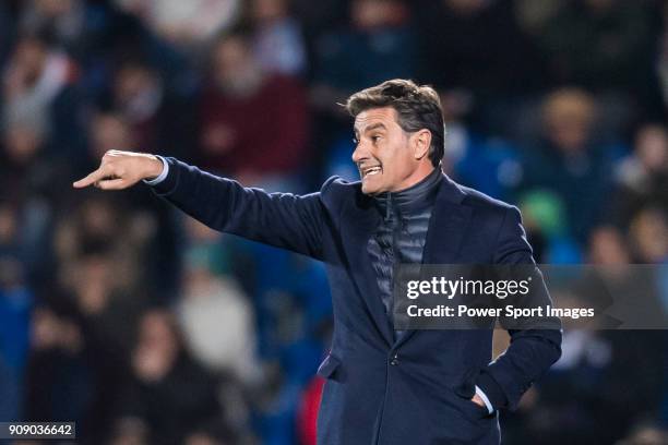 Coach Jose Miguel Gonzalez Martin del Campo, Michel, of Malaga CF gestures during the La Liga 2017-18 match between Getafe CF and Malaga CF at...