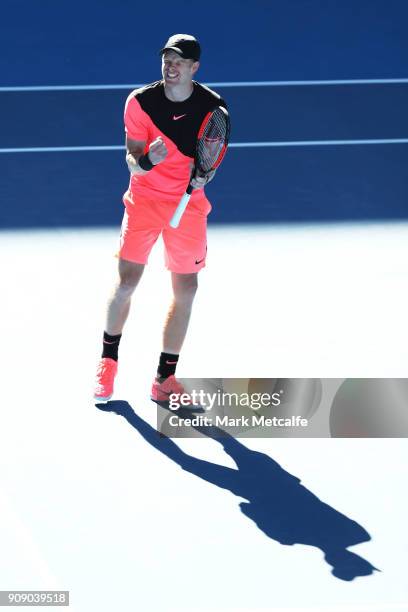 Kyle Edmund of Great Britain celebrates winning match point in his quarter-final match against Grigor Dimitrov of Bulgaria on day nine of the 2018...