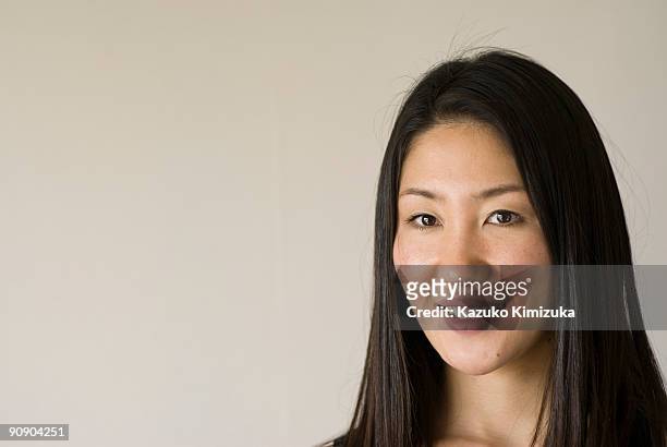 young woman portrait,smiling - kazuko kimizuka ストックフォトと画像