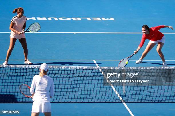 Lindsay Davenport of the United States and Iva Majoli of Croatia compete in their legend's doubles match against Nicole Bradtke of Australia and...