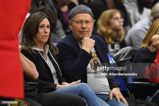 Actor Billy Crystal and Janice Crystal attend a basketball game between the Los Angeles Clippers and the Minnesota Timberwolves at Staples Center on...