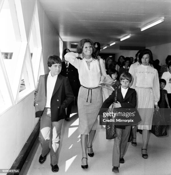 Sophia Loren and her sons Carlo Ponti, Jr. And Edoardo Ponti at London Airport. August 1980.