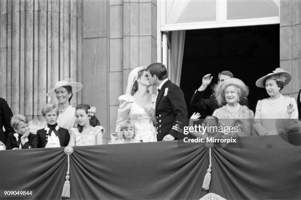 The wedding of Prince Andrew, Duke of York, and Sarah Ferguson. The Duke and Duchess of York wave to crowds from the balcony of Buckingham Palace....