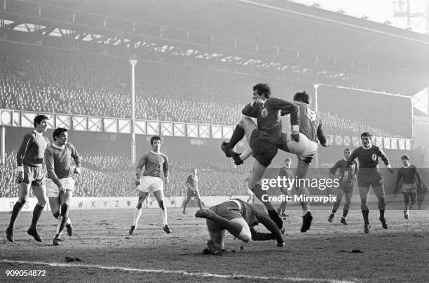 English League Division One match at Goodison Park. Everton 1 v Liverpool 0. Everton's Joe Royle jumps up for the ball with Tommy Smith as goalkeeper...