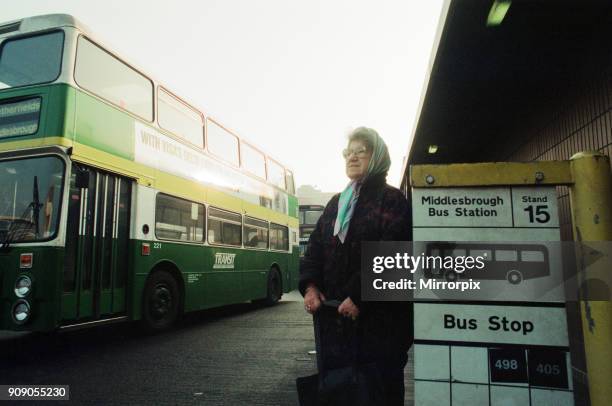 Pensioner, Mary Foster, waits for a bus, Middlesbrough Bus Station, 19th February 1994.