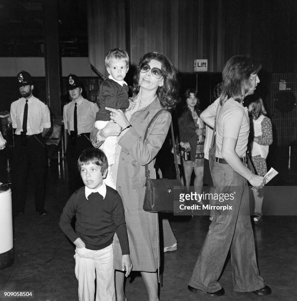 Italian actress Sophia Loren and her two children leaving Heathrow Airport for Rome. August 1974.