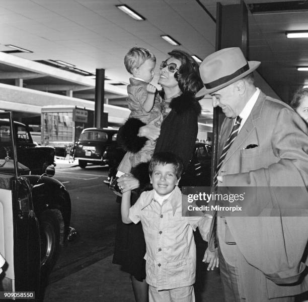 Film producer Carlo Ponti arrives in London with his two sons Edward, aged 17 months and Carlo Jnr, aged 5 years. There to meet them was their mother...