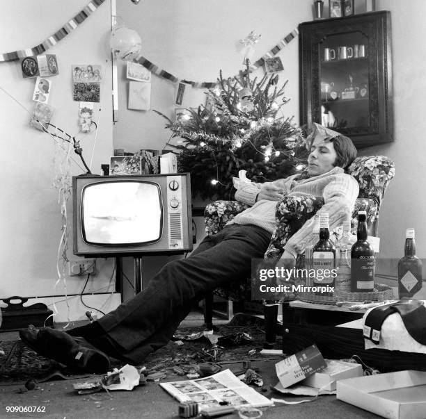 Typical family scene around the television on Christmas day. Hampstead, 20th December 1970.