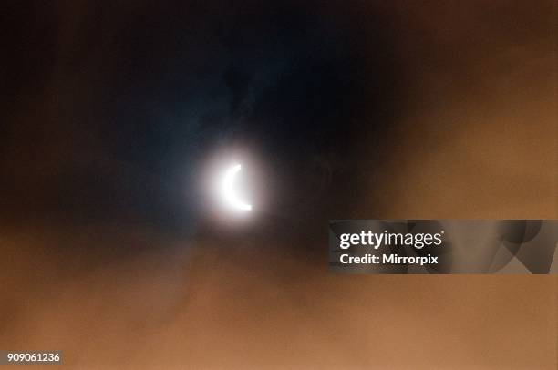 People watching a total solar eclipse, Caerphilly mountain, 11th August 1999.