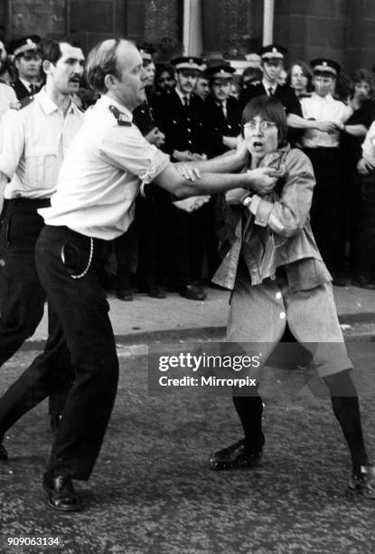 Police grapple with demonstrators during the National Front demo in Glasgow, 24th May 1975.