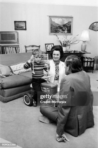 Rupert Thorpe, who will be four in April, pictured with his new mother-to-be, Lady Marion Harewood and his father Jeremy Thorpe at their London home,...