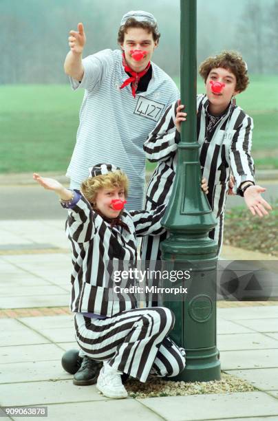 Three of the staff from the Forest of Arden Hotel, Golf and Country Club who are making their way to Scotland dressed as criminals for Comic Relief...