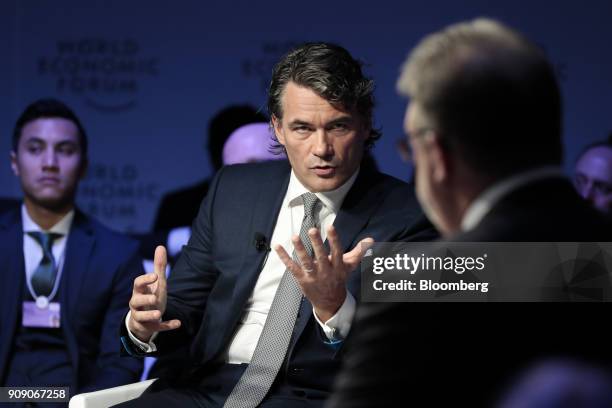 Gavin Patterson, chief executive officer of BT Group Plc, gestures while speaking on a panel session on the opening day of the World Economic Forum...