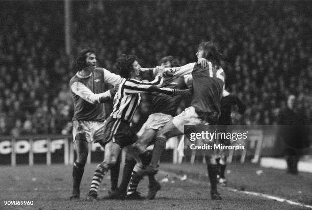 Arsenal 2-2 Newcastle, League Division One match at Highbury, Saturday 27th January 1973. Charlie George blows his top after a tackle by David Craig...