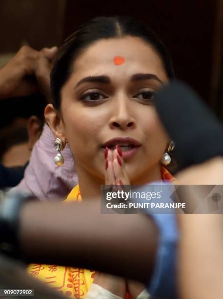 Indian Bollywood actress Deepika Padukone, lead of the film 'Padmaavat', visits the Hindu Siddhivinayak Temple ahead of the film's release in Mumbai...