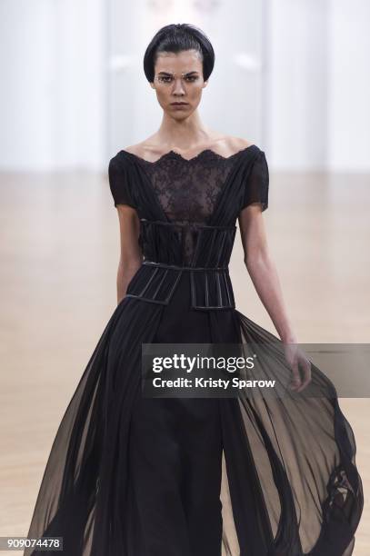 Model walks the runway during the On Aura Tout Vu Spring Summer 2018 show as part of Paris Fashion Week on January 22, 2018 in Paris, France.