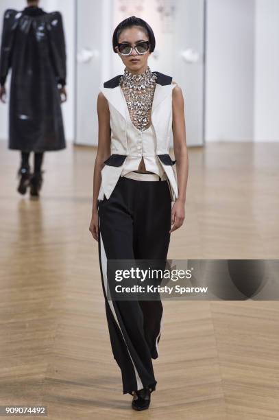 Model walks the runway during the On Aura Tout Vu Spring Summer 2018 show as part of Paris Fashion Week on January 22, 2018 in Paris, France.