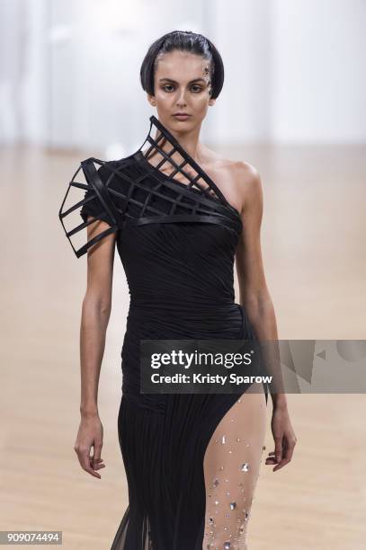 Model walks the runway during the On Aura Tout Vu Spring Summer 2018 show as part of Paris Fashion Week on January 22, 2018 in Paris, France.