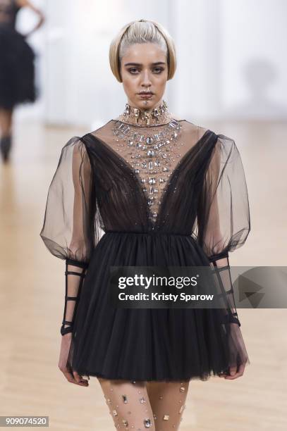 Model walks the runway during the On Aura Tout Vu Spring Summer 2018 show as part of Paris Fashion Week on January 22, 2018 in Paris, France.