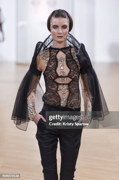 Model walks the runway during the On Aura Tout Vu Spring Summer 2018 show as part of Paris Fashion Week on January 22, 2018 in Paris, France.