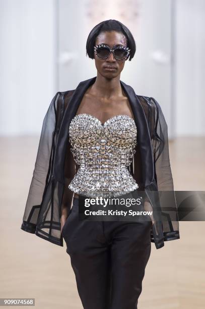 Model walks the runway during the On Aura Tout Vu Spring Summer 2018 show as part of Paris Fashion Week on January 22, 2018 in Paris, France.