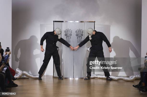 Models walk the runway during the On Aura Tout Vu Spring Summer 2018 show as part of Paris Fashion Week on January 22, 2018 in Paris, France.