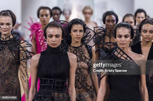 Models walk the runway during the On Aura Tout Vu Spring Summer 2018 show as part of Paris Fashion Week on January 22, 2018 in Paris, France.