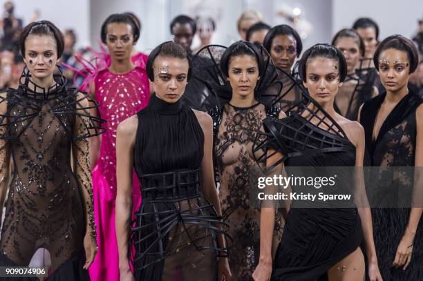 Models walk the runway during the On Aura Tout Vu Spring Summer 2018 show as part of Paris Fashion Week on January 22, 2018 in Paris, France.