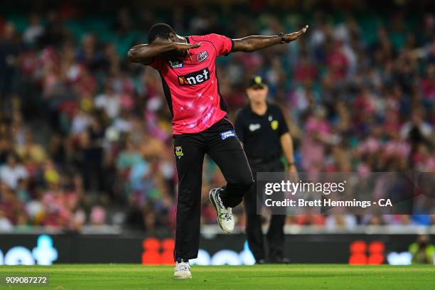 Carlos Brathwaite of the Sixers celebrates taking the wicket of Glenn Maxwell of the Stars during the Big Bash League match between the Sydney Sixers...