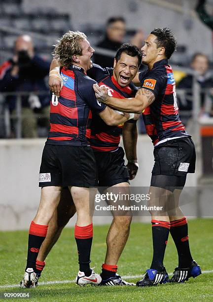 Tu Umaga-Marshall of Canterbury celebrates his try with team mates Andy Ellis and Steve Brett during the Ranfurly Shield Air New Zealand Cup match...