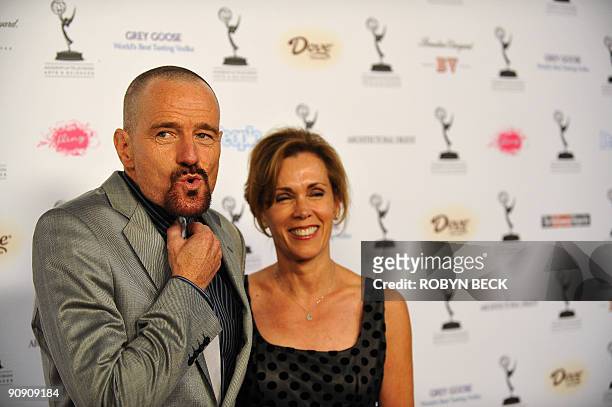Actor Bryan Cranston and his wife Robin Dearden arrive for the 61st Primetime Emmy Awards outstanding performance nominees reception in West...