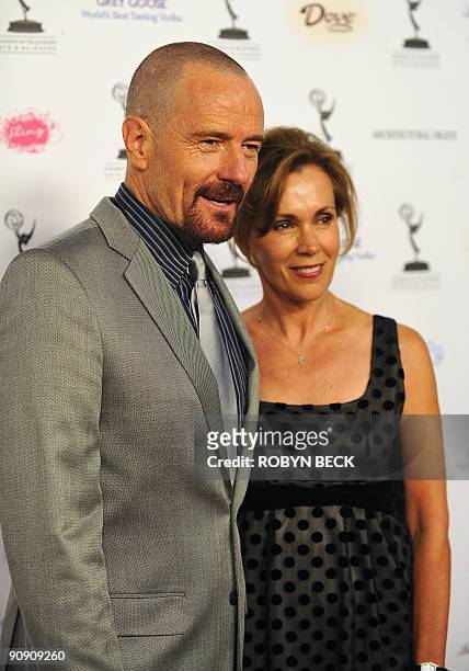 Actor Bryan Cranston and his wife Robin Dearden arrive for the 61st Primetime Emmy Awards outstanding performance nominees reception in West...