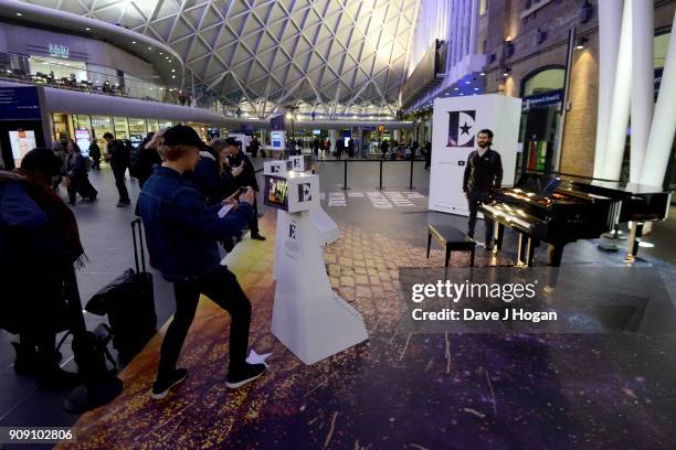 London commuters transported back to 1970's LA with the Elton John augmented reality experience supported by YouTube at Kings Cross Station on...