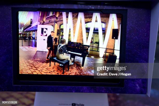 London commuters transported back to 1970's LA with the Elton John augmented reality experience supported by YouTube at Kings Cross Station on...