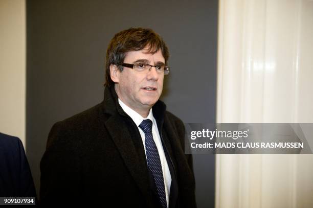 Catalonia's sacked president Carles Puigdemont arrives for a meeting with Danish members of the Parliament, on January 23, 2018 at Christiansborg...