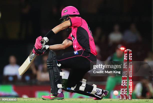 Johan Botha of the Sixers is bowled by Evan Gulbis of the Stars during the Big Bash League match between the Sydney Sixers and the Melbourne Stars at...
