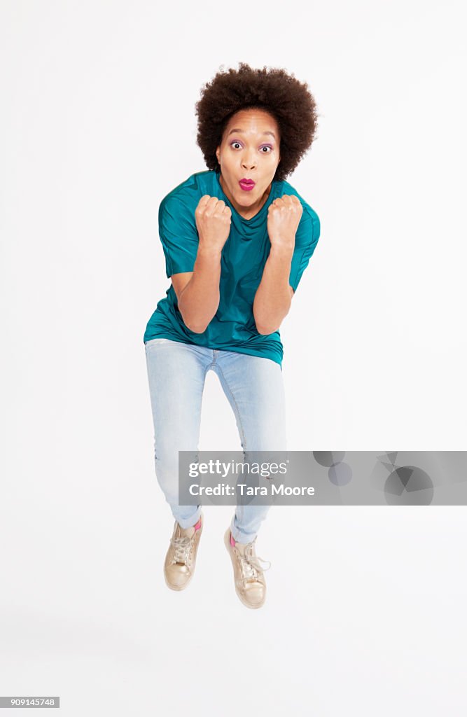 Woman jumping in celebration