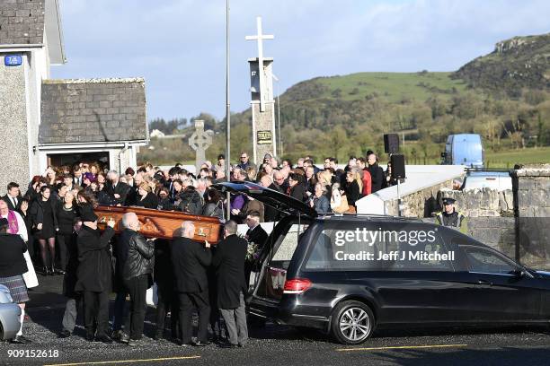 The coffin of Dolores O'Riordan is carried out of St Ailbe's parish church in Ballybricken after the funeral on January 23, 2018 in Limerick,...